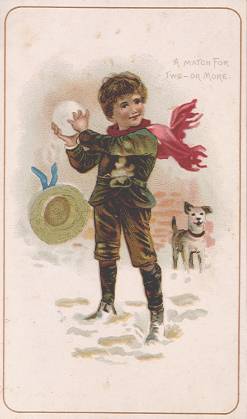 Boy with giant snowball and dog